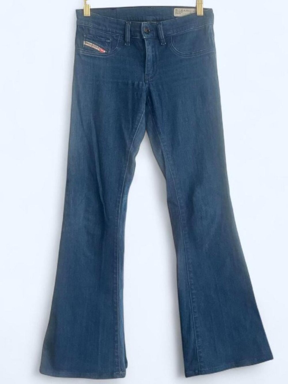 Diesel blue low waisted boot cut jeans Size 25 length 30”